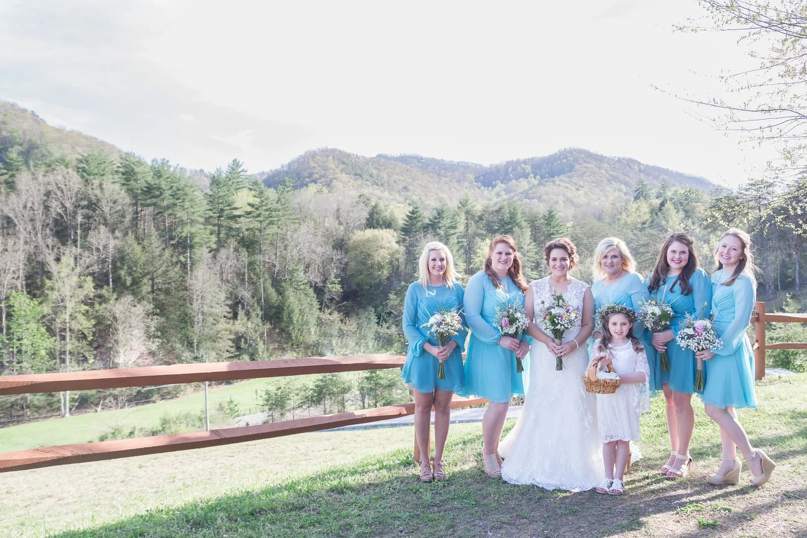 Bride and bridesmaids with Smoky Mountain views at Moose Hollow Lodge in Pigeon Forge near Dollywood