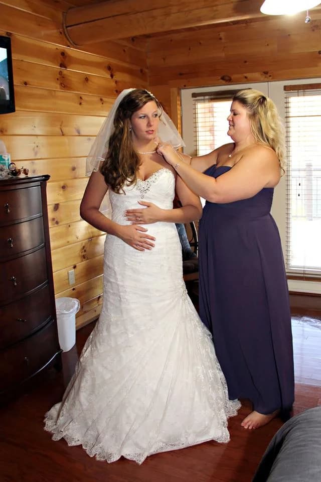 Bride getting ready in rustic log cabin bedroom at Moose Hollow Lodge in Pigeon Forge